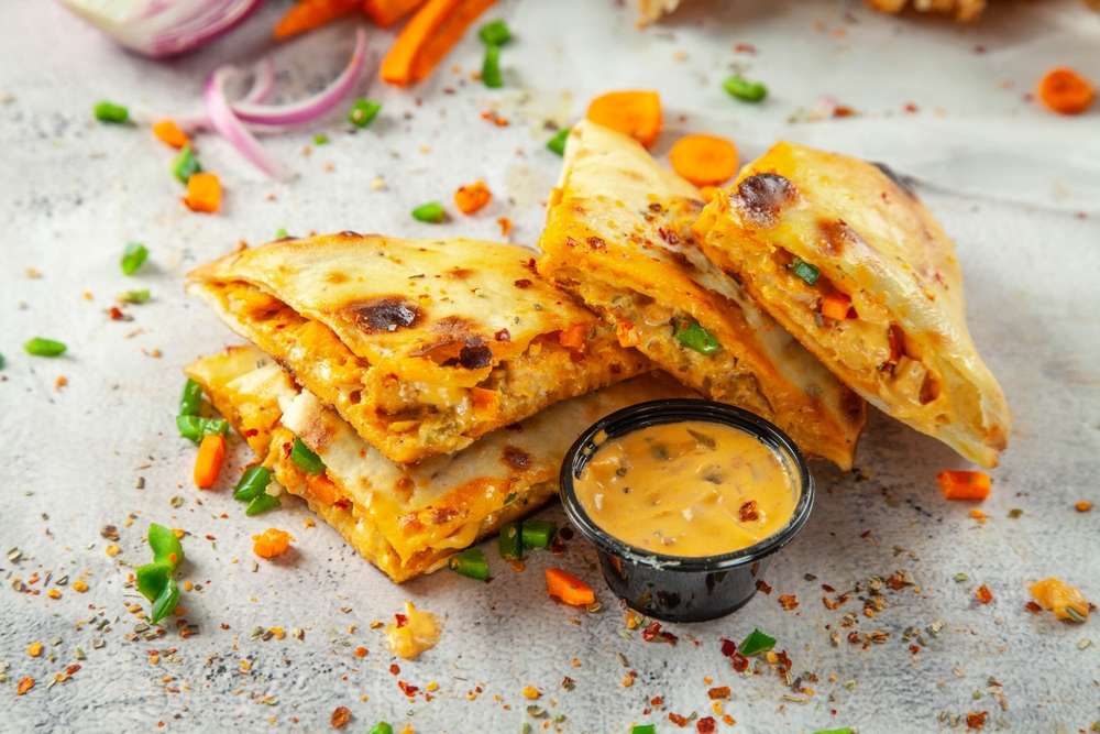 Philly Cheesesteak Quesadillas with Peppers and Onions
